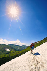 Obraz premium Long trip to the top of the mountain in the summer.