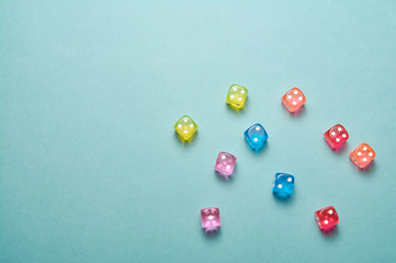 Scattered dice on blue background