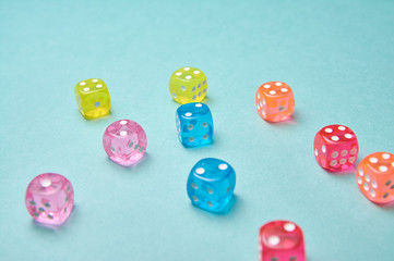 Scattered dice on blue background