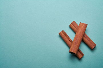 Cinnamon on blue background