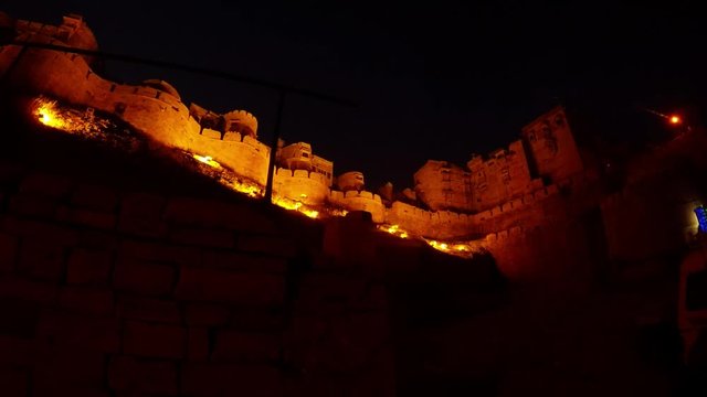 Walls of ancient Golden Fort Jaisalmer in night with lights