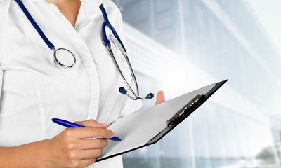 Close-up Doctor at hospital working with tablet pc