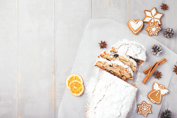Christmas stollen on grey table.