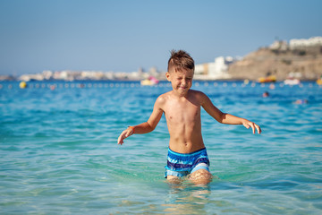 Caucasian boy against the sea.