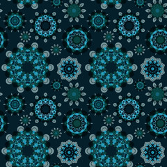 Seamless geometric pattern from rounded abstract ornaments multicolored in green and turquoise shades on a dark background. Vector illustration. Suitable for fabric, wallpaper and wrapping paper