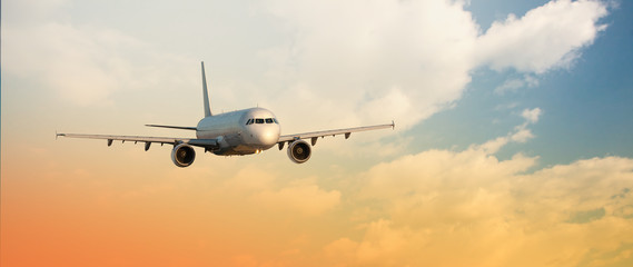 airplane flying away in to sky