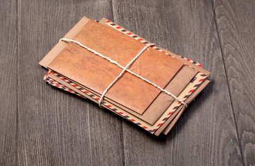 Stack of envelopes on wooden