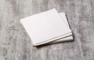 white paper napkin on  table - obrazy, fototapety, plakaty