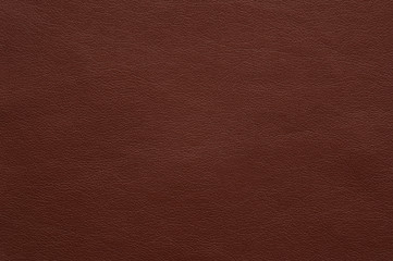 Bright brown faux leather with fine texture.