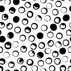 Vector seamless polka dot pattern. Hand drawn vector ornament for wrapping paper.	 