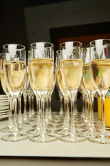 many of the champagne glasses on the table party celebration concept