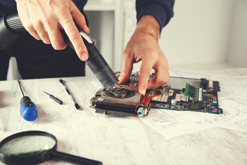 hand computer processor with a vacuum cleaner