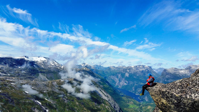 tourist visiting the high mountains in norway