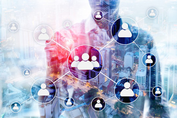 HR - Human resources management concept on blurred business center background.