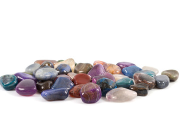 Colorful boho style gems isolated on white background with space for text