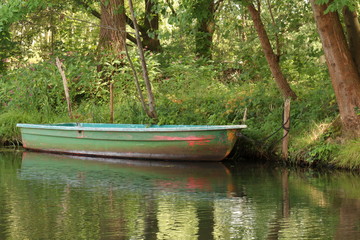 green boat on the lake