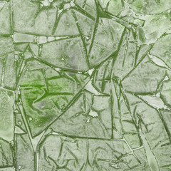 Watercolor green abstract texture with washes and brush strokes on the white paper background.