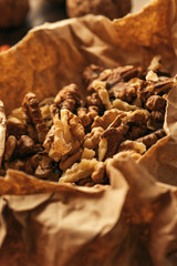 Walnut kernels wrapped in paper, macro