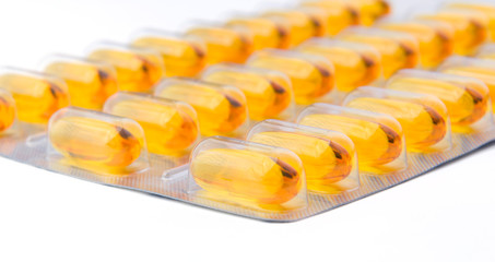 Fish oil capsules in a blister. Close-up.