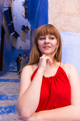 Chefchaouen, North Morocco / Africa. November 9th 2018 : Polish model posing near some kids from chefcaouen, Morocco.