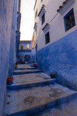 Tipical street of the blue medina of chefchaouen, called also blue pearl for his light blue streets. Stairs in the blue pearl of Morocco, North Africa.