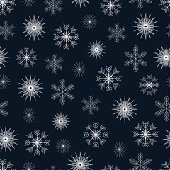 Winter seamless pattern with snowflakes on a dark blue background