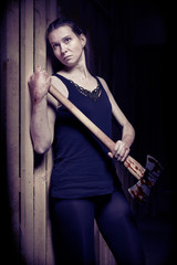 Vulnerable woman in underwear escaping from basement