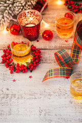 Whiskey, brandy or liquor shot and Christmas decorations