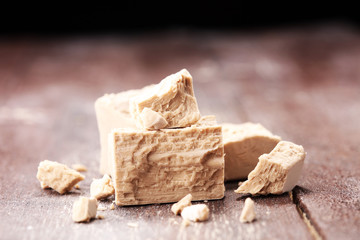 Dry yeast crumbled and yeast block for baking