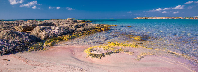 Fototapeta na wymiar Elafonissi beach with pink sand on Crete island with azure clear water, Greece, Europe