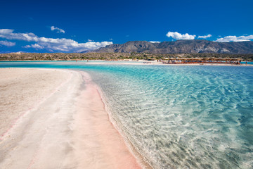 Elafonissi beach with pink sand on Crete island with azure clear water, Greece, Europe