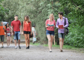 group of College students walking together in the Park