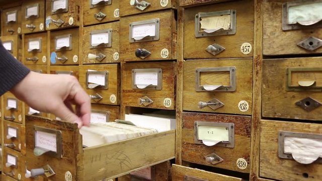 man searching in document file database