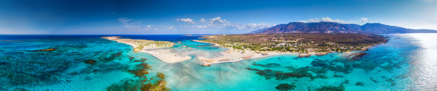 Fototapeta Aerial view of Elafonissi beach on Crete island with azure clear water, Greece, Europeof Elafonissi beach on Crete island with azure clear water, Greece, Europe