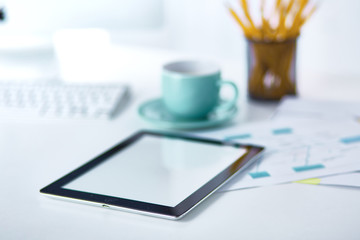 A cup of coffee on the office table