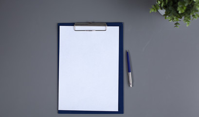 a blank sheet of paper on the table