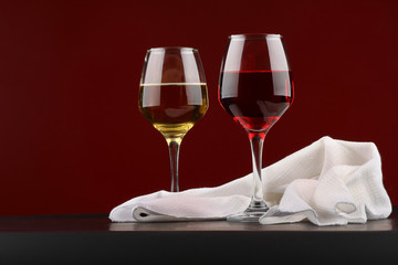 Still life with glasses of red and white wine