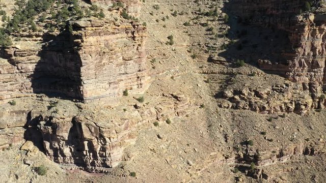 Aerial fly across desert mountain cliff Nine Mile Canyon Utah pull. Nine Mile Canyon, Utah. World’s longest art gallery of ancient native American, Indian rock art, hieroglyphs, pictographs.