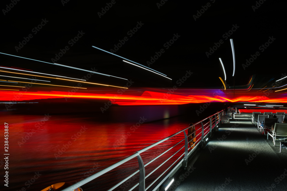 Poster Walking around Paris on a boat on the Seine River in the night