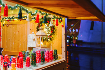 Festive stall with candles on Christmas market in Vilnius