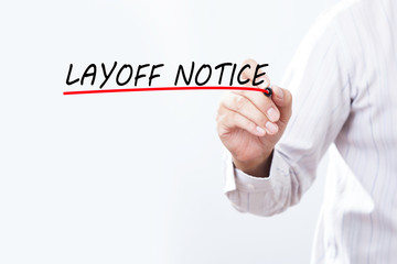 Businessman draw layoff notice word.Business concept.