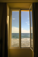 View of the Mediterranean Sea from a window, Alassio, Liguria, Italy