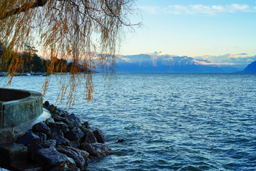 Approacxhing sundown by the shores of Lake Geneva (Lake Leman) on a winter's day