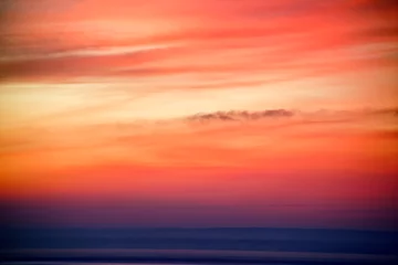 Foto op Plexiglas zonsondergang over de zee © Like