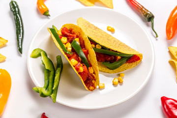 Stuffed colorful burritos on a white background