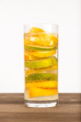 Fresh lemonade in high glass isolated on white background