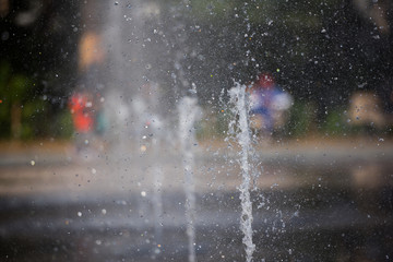 drops and splashes of water from the fountain