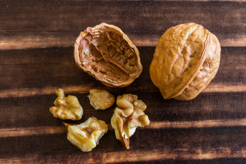 close-up on walnuts over wood
