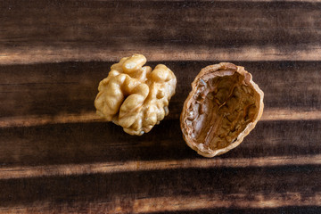 close-up on walnuts over wood