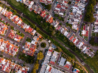 AERIAL: Suburbs and river from a drone